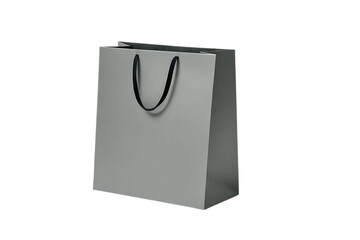 White paper shopping bag with black handles, isolated on black. Retail mockup.