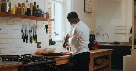 Cooking, spice and steak with black man in kitchen of home for meal preparation or recipe. Culinary skills, flavor and protein food with chef person in apartment for diet, health or nutrition