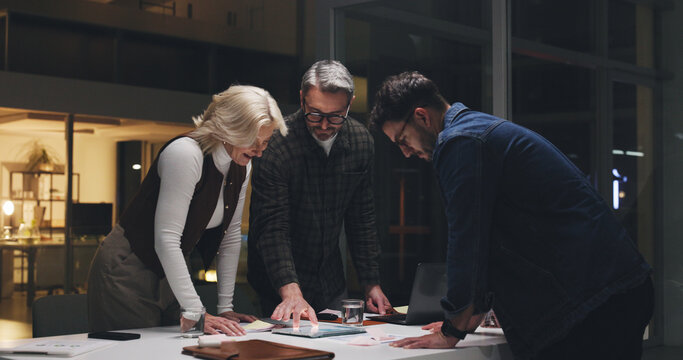 Business people, tablet and teamwork at night for brainstorming, schedule or project deadline. Group, employees and working late with technology for creative development or agenda review in office - Powered by Adobe