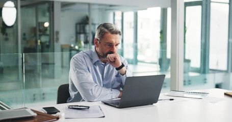 Business, man and thinking with laptop in office for finance report, investment strategy or review. Financial manager, mature person and tech at firm for data analysis, budget oversight and decision