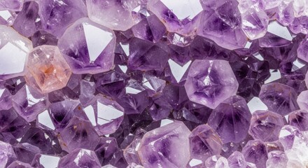 Fototapeta premium Close up macro view of sparkling purple amethyst crystal cluster with sharp facets and natural geometric formations