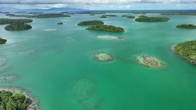 Aerial view over the small islands situated in the Vona Vona Lagoon, Solomon Islands