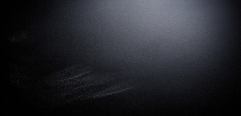 Dark, textured surface with light streaks