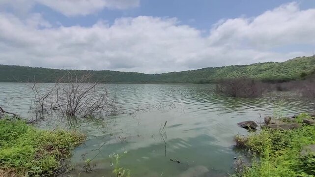 Lonar crater created from a meteor, Salty and Alkaline lake, Lonar, Maharashtra