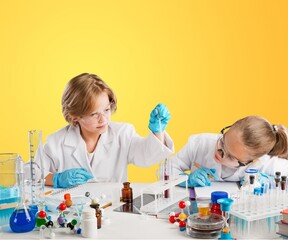 Kids at school learning science chemistry.