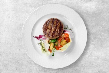 Grilled tasty beef steak with fresh vegetables