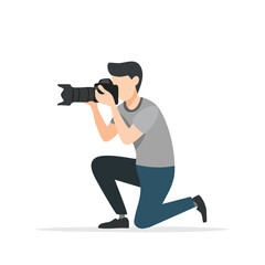 Male Photographer Kneeling, DSLR Camera, Casual Style