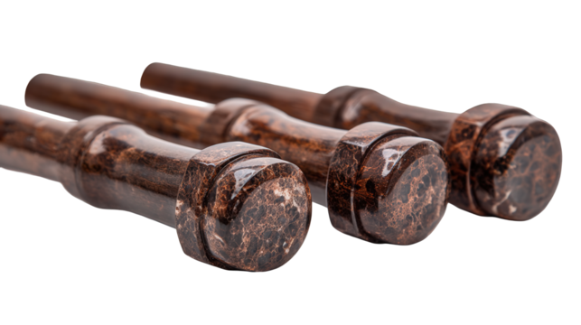 Three Brown Wooden Hammers with Metal Heads on Black Background