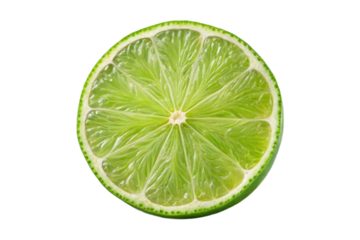 A top down view of several lime wedges and halves scattered on a plain white surface studio shot image lime on white background