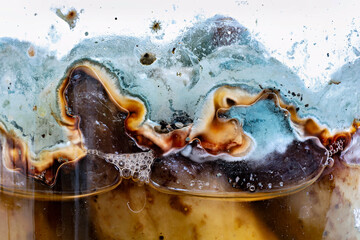 This image appears to show a close-up of a frozen drink with a layered appearance possibly a slushie or a frosty beverage