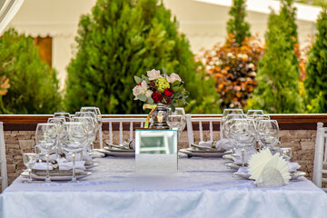 This is an image of a beautifully set outdoor dining table