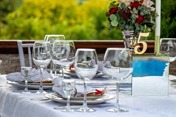 This is an image of a table setting for a special occasion likely a wedding or an anniversary celebration