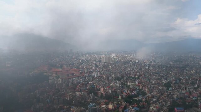 Kathmandu in Turmoil: Smoke Over Prime Minister's Office During Protests. Protesters Setting Fire to Singha Durbar-Aerial Drone Footage. Kathmandu Under a Haze of Smoke During Protests