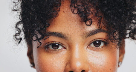 Portrait, black woman and eyes with skincare in studio for beauty, laminated eyebrows and natural...