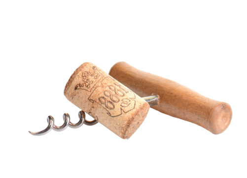 Wooden handle cork screw with wine cork over white background isolated