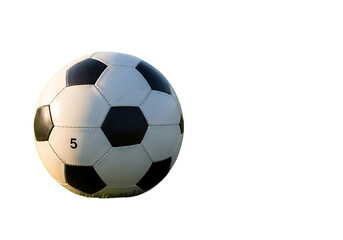 Obraz premium Classic soccer ball with black and white panels isolated on black