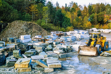 Loader in a stone quarry with limestones