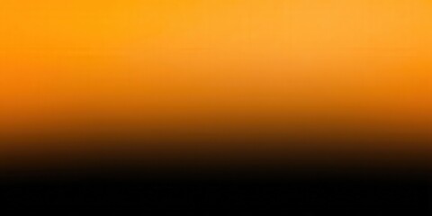 A captivating gradient of orange and black creates a striking visual impact.