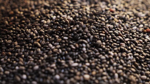 Chia seeds for a healthy diet, a large number of chia seeds for adding to yogurt, desserts and other food products. High quality 4k footage
