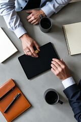 Inclusive modern workplace showing diverse collaboration, with assistive technology like hearing aids and accessible, focused work pods.