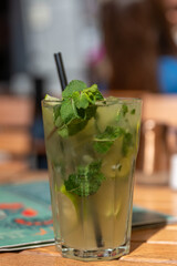 mojito cocktail on wooden table