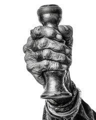 Close Up of an Aged Hand with Silver Rings Holding a Hand Grinder