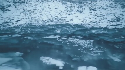 Frozen landscape with snow-covered rocks and ice-covered water - Powered by Adobe