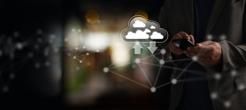 Cloud computing and data synchronization concept with secure online storage and mobility, shown by businessman using smartphone with network nodes and upload download arrows.