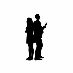 Silhouette of a couple enjoying live music together at a concert