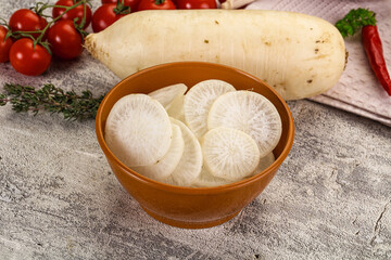 Sliced white daikon radish in the bowl