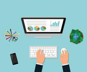 Overhead View of Desktop Computer with Hands Using Keyboard and Mouse Analyzing Charts on Blue Background