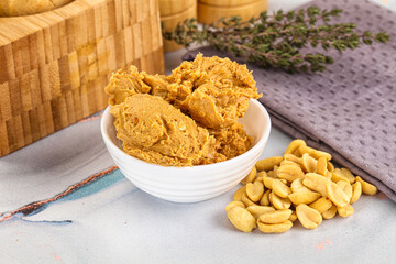 Crunchy peanut butter fat product