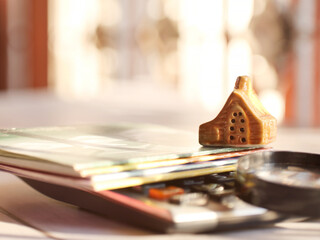 A financial business concept of housing loans with a house as the main component and copy space.