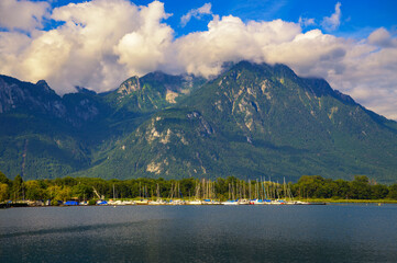 Sailboats at Port de Villeneuve on Lake Geneva, with the Chablais Alps in the Swiss Alps rising behind.