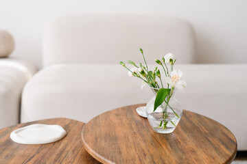 Small Glass Vase With White Flowers Indoors