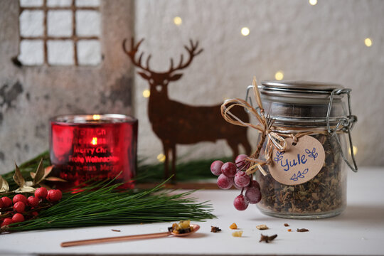 Yule  incense blend with frankincense, resins and herbs on wooden table