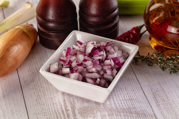 Diced red onion in the bowl