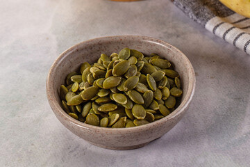 Fresh green pumpkin peeled seeds