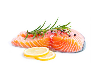 Fresh salmon fillet, spices and lemon slices on white background