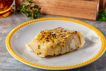 Steamed cod fish fillet with spices