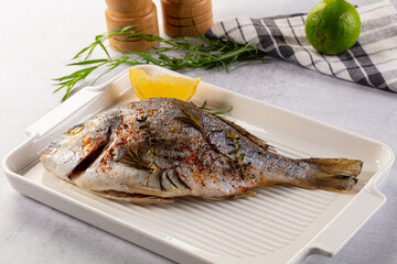 Baked dorada fish with spices
