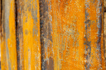 Rusty metal texture and vignette with peeling paint and weathered surface. Grunge industrial background for vintage design, abstract art, and creative graphic elements