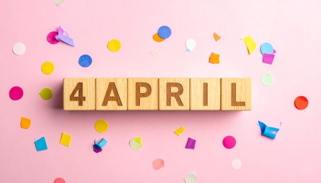 Wooden Blocks with Date 4 April. Calendar for birthday or anniversary on solid colored background with confetti