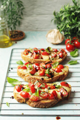 Freshly made bruschetta sandwiches - traditional dish of Italian cuisine