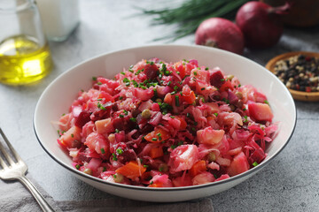 A bowl with Vinegret salad, a typical Russian dish	
