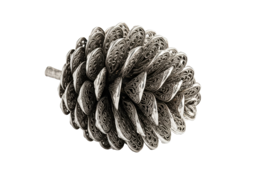 Ornate silver filigree pine cone with sculptural floral scales, tilted on a transparent studio background with copy space, concept of exquisite luxury decor