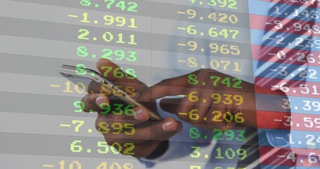 Tapping man's hands holding smartphone in digital interface, with overlaid financial data