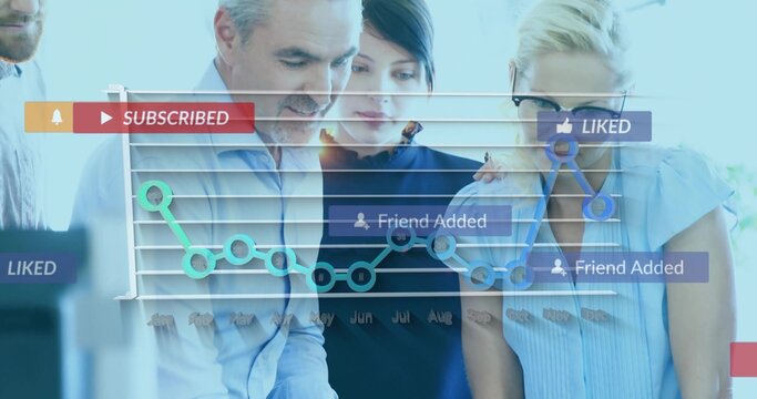 Examining team in shirts analyzing dashboard in office with SUBSCRIBED LIKED Friend Added icons