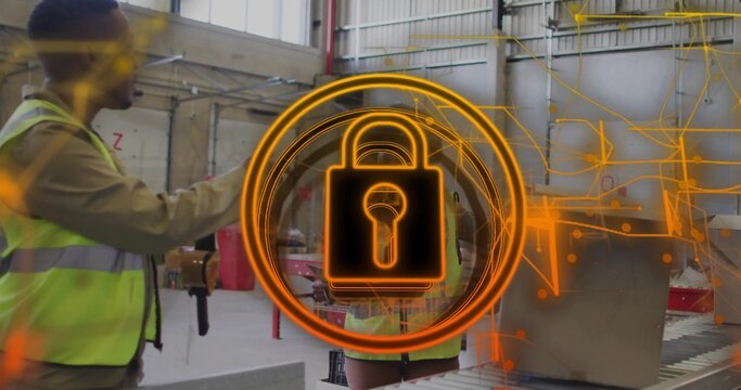 Workers wearing vests scanning boxes with scanner on warehouse conveyor belt, with glowing padlock
