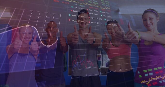 Smiling group of five standing in gym workout attire, giving thumbs-up with stock chart overlays